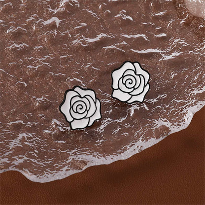 White & Silvertone Camellia Stud Earrings