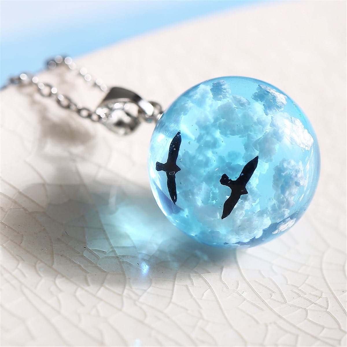 Blue Resin & Silvertone Cloud Bird Round Pendant Necklace