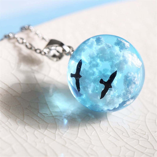 Blue Resin & Silvertone Cloud Bird Round Pendant Necklace