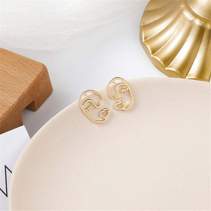 Goldtone Abstract Face Stud Earrings