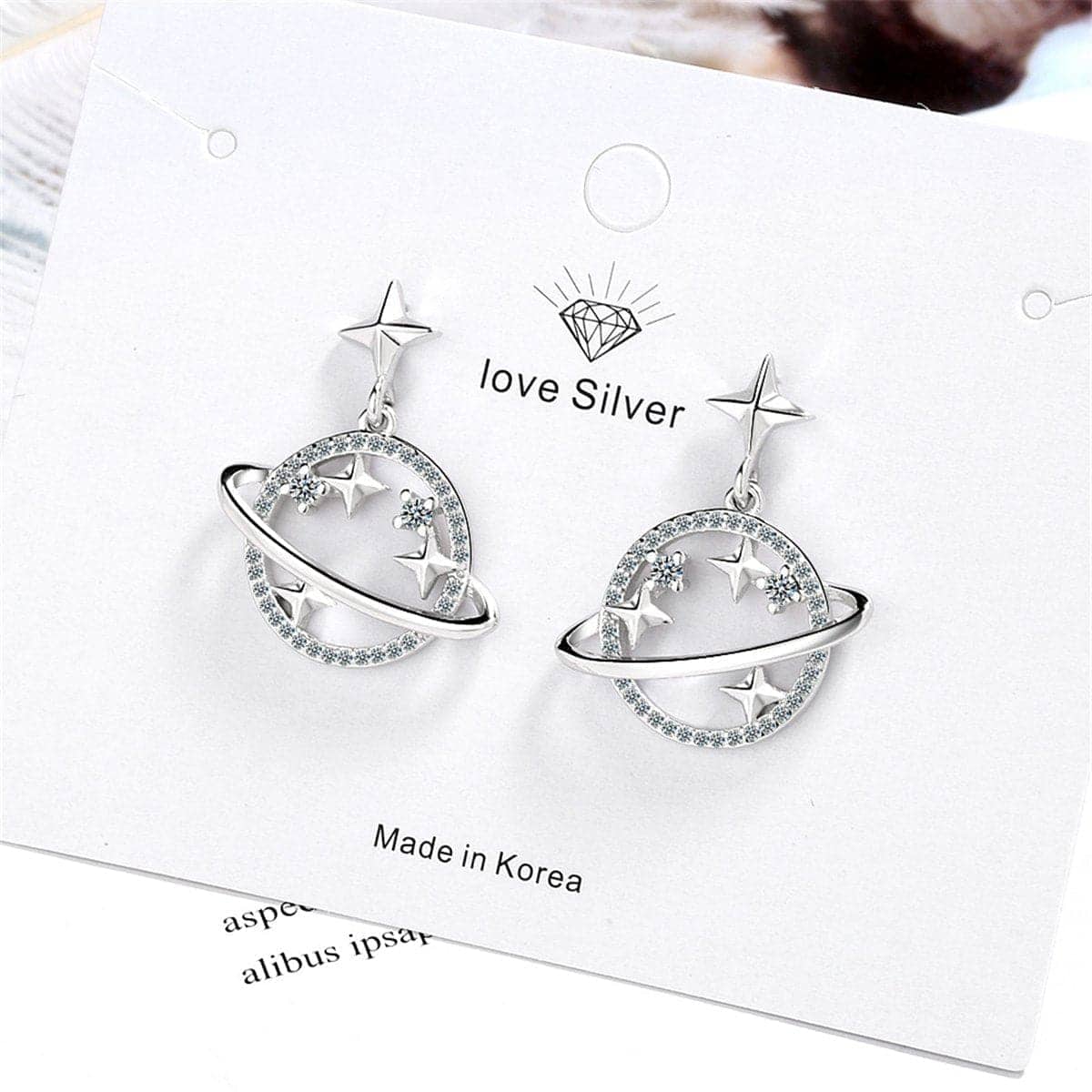 Cubic Zirconia & Silvertone Planet Drop Earrings