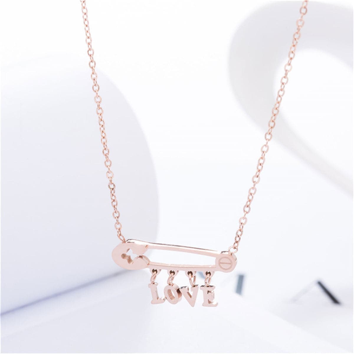 Rose Goldtone 'Love' Safety Pin Pendant Necklace