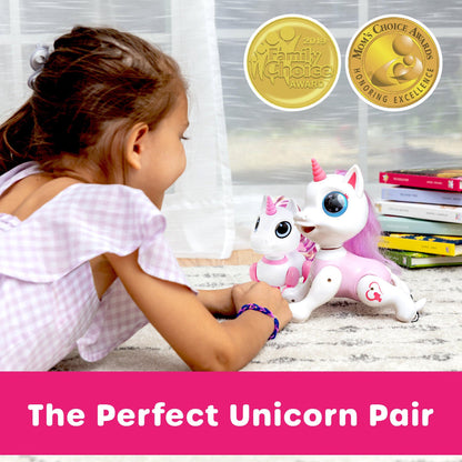 Pink/White robot unicorn, white remote, and , pink and black food-