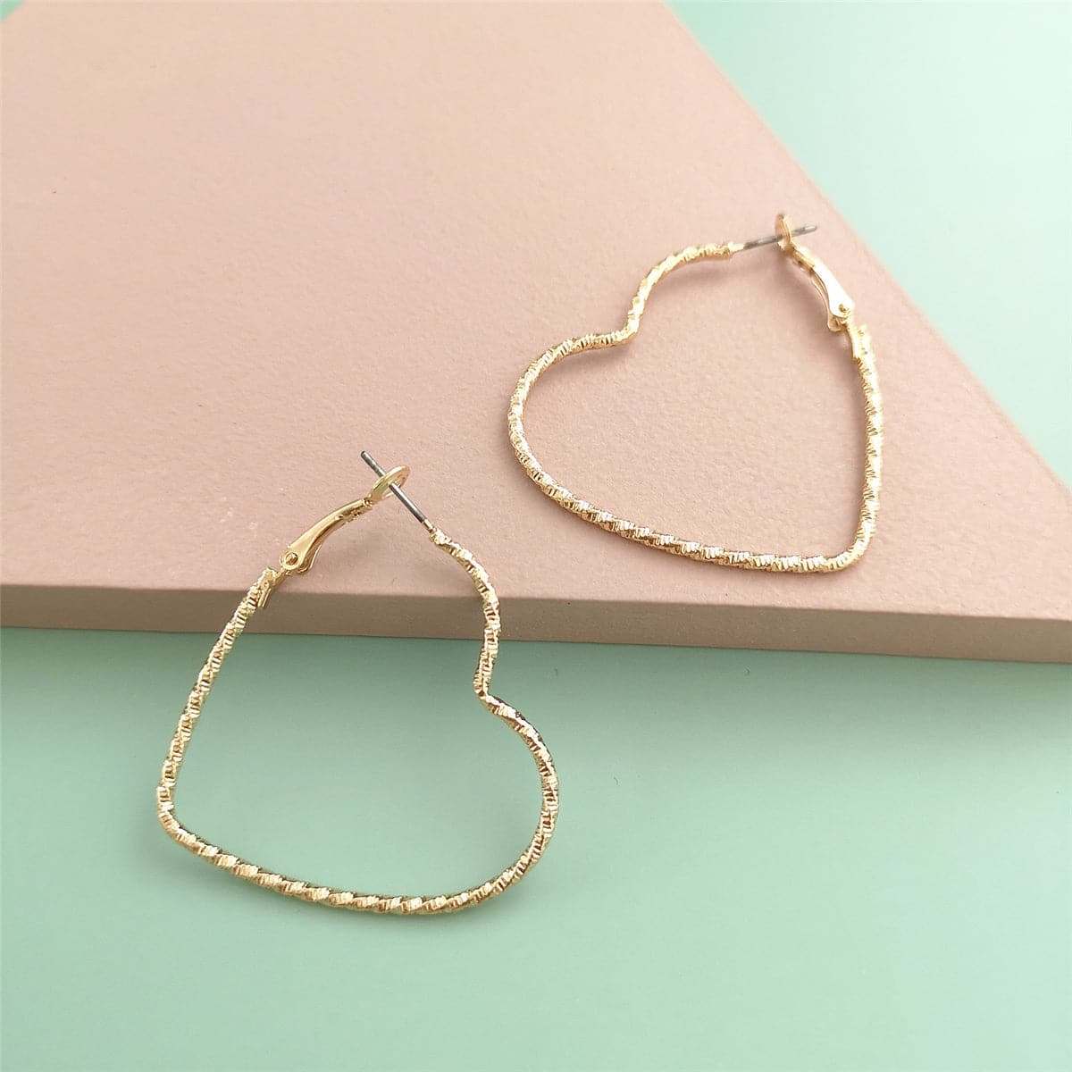 Goldtone Twisted Open Heart Hoop Earrings