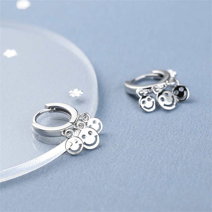 Silvertone Smiley Tassel Huggie Earrings