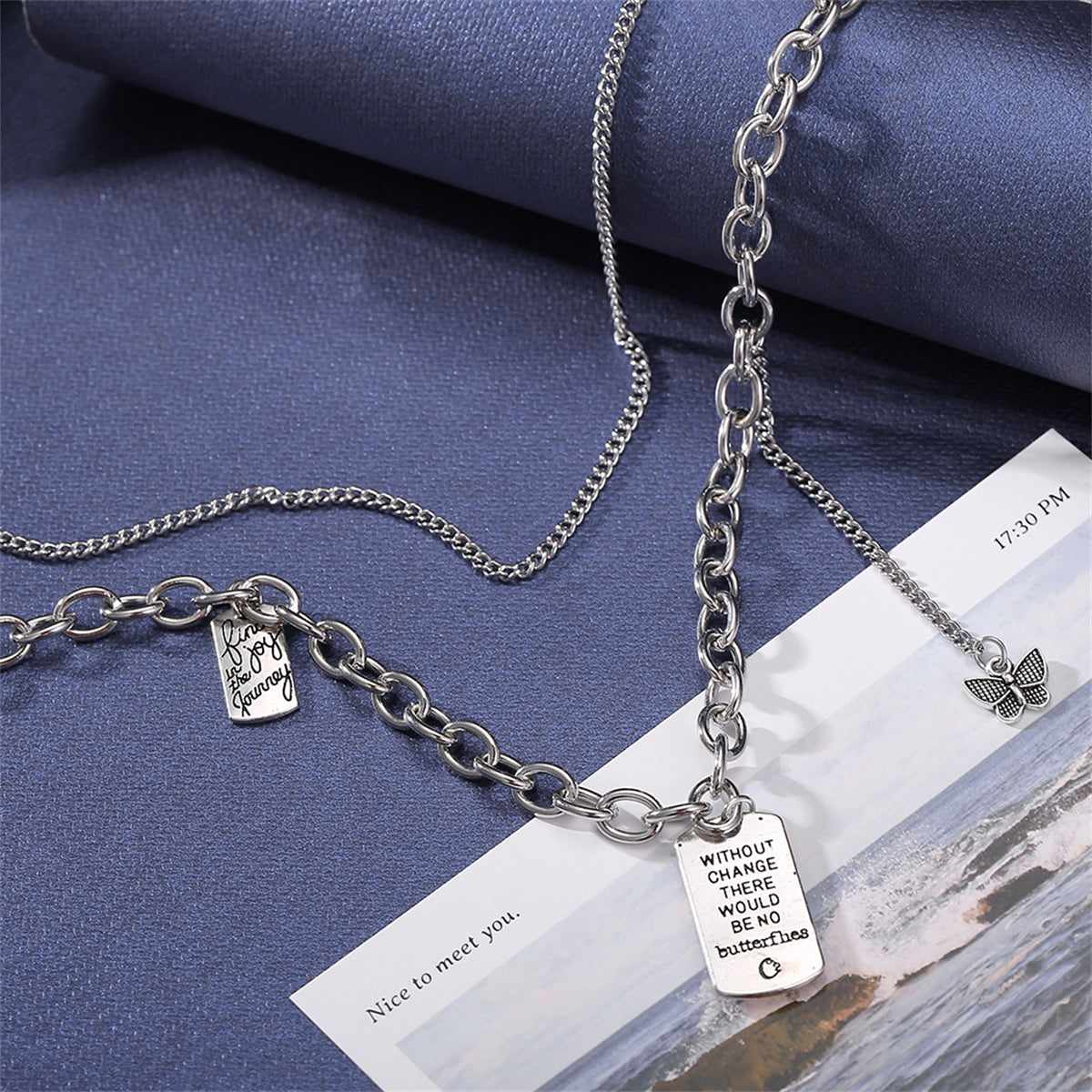 Silvertone Butterfly 'Change' Layered Pendant Necklace