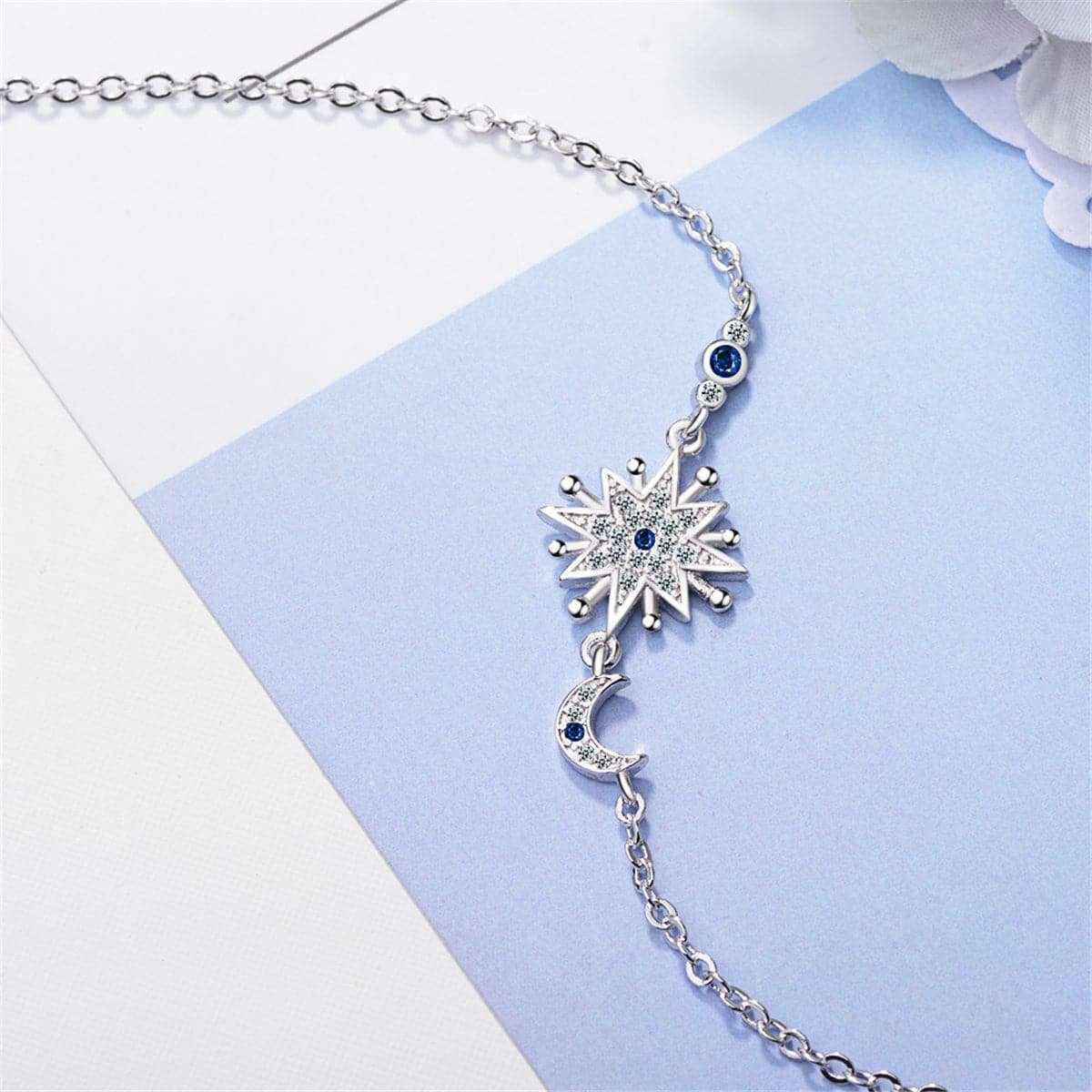 Blue Crystal & Silvertone Star & Moon Bracelet