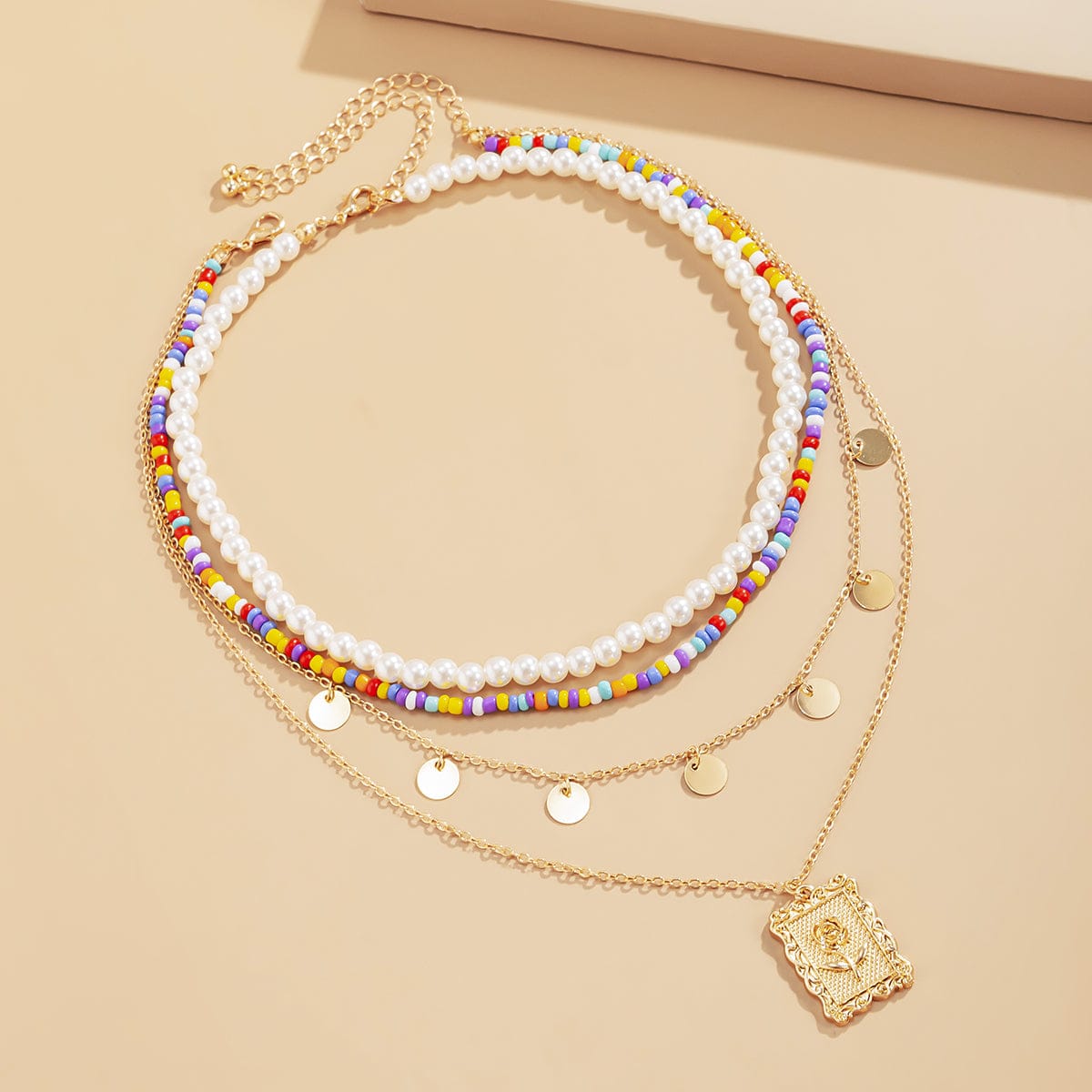 Goldtone Rose Card Pendant Necklace Set