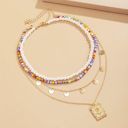 Goldtone Rose Card Pendant Necklace Set