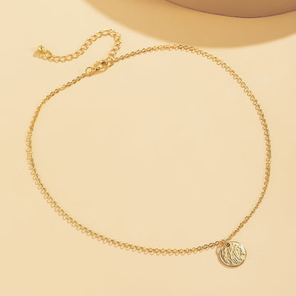 Goldtone Textured Circle Pendant Necklace