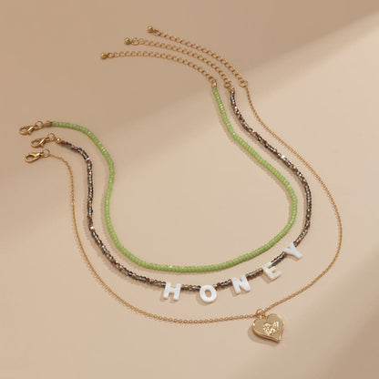 Multicolor Howlite & Acrylic Goldtone 'Honey' Angel Heart Pendant Necklace Set