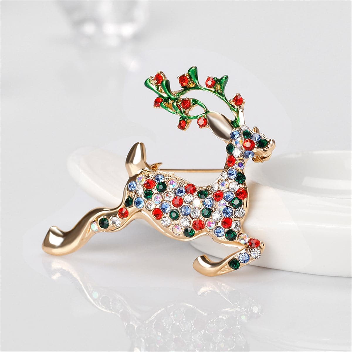 Cubic Zirconia & Goldtone Jumping Reindeer Brooch