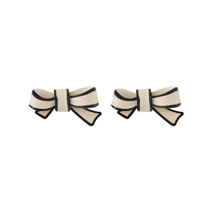 White Polyurethane & Silvertone Bow Stud Earrings
