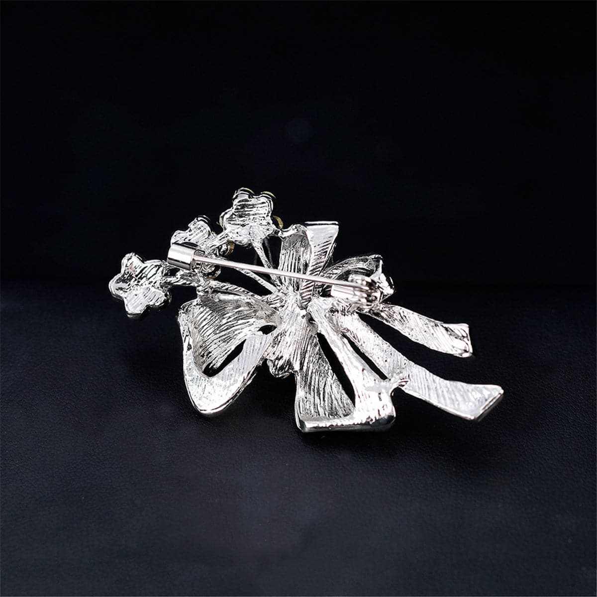 Cubic Zirconia & Silvertone Bow Botany Brooch