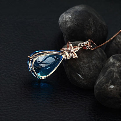 Blue Crystal & Cubic Zirconia Pear Cut Flower Pendant Necklace