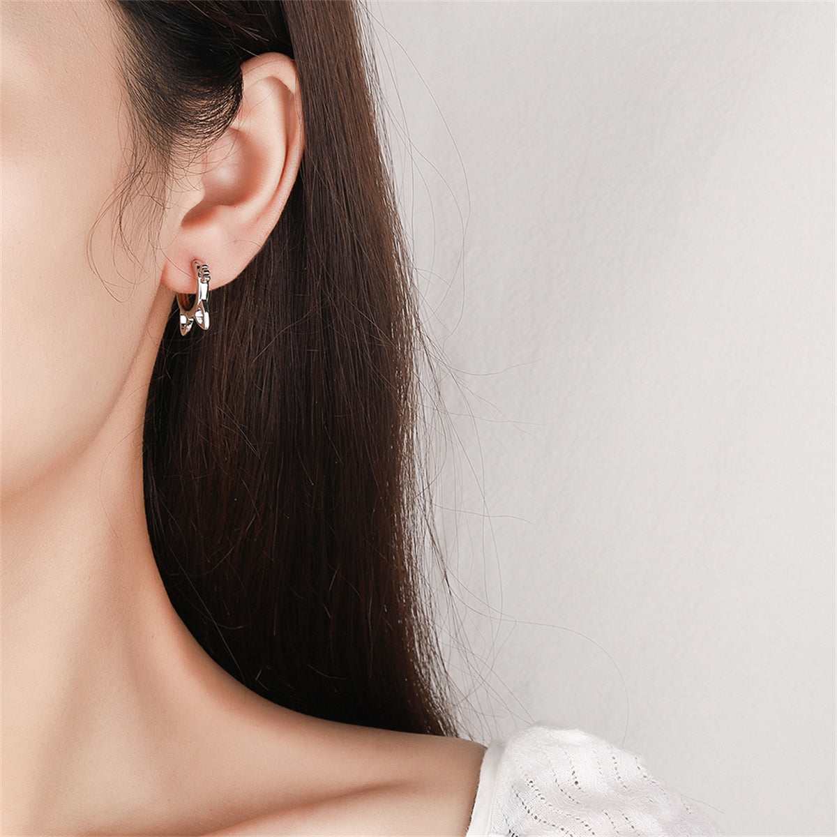 Silvertone Cat-Shape Huggie Earrings