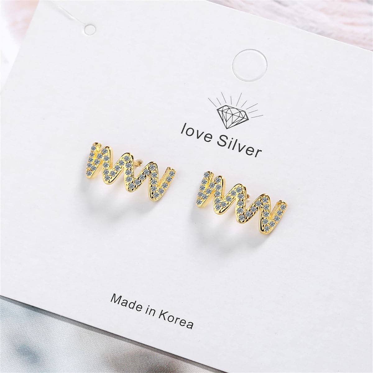 Cubic Zirconia & Goldtone Wave Stud Earrings
