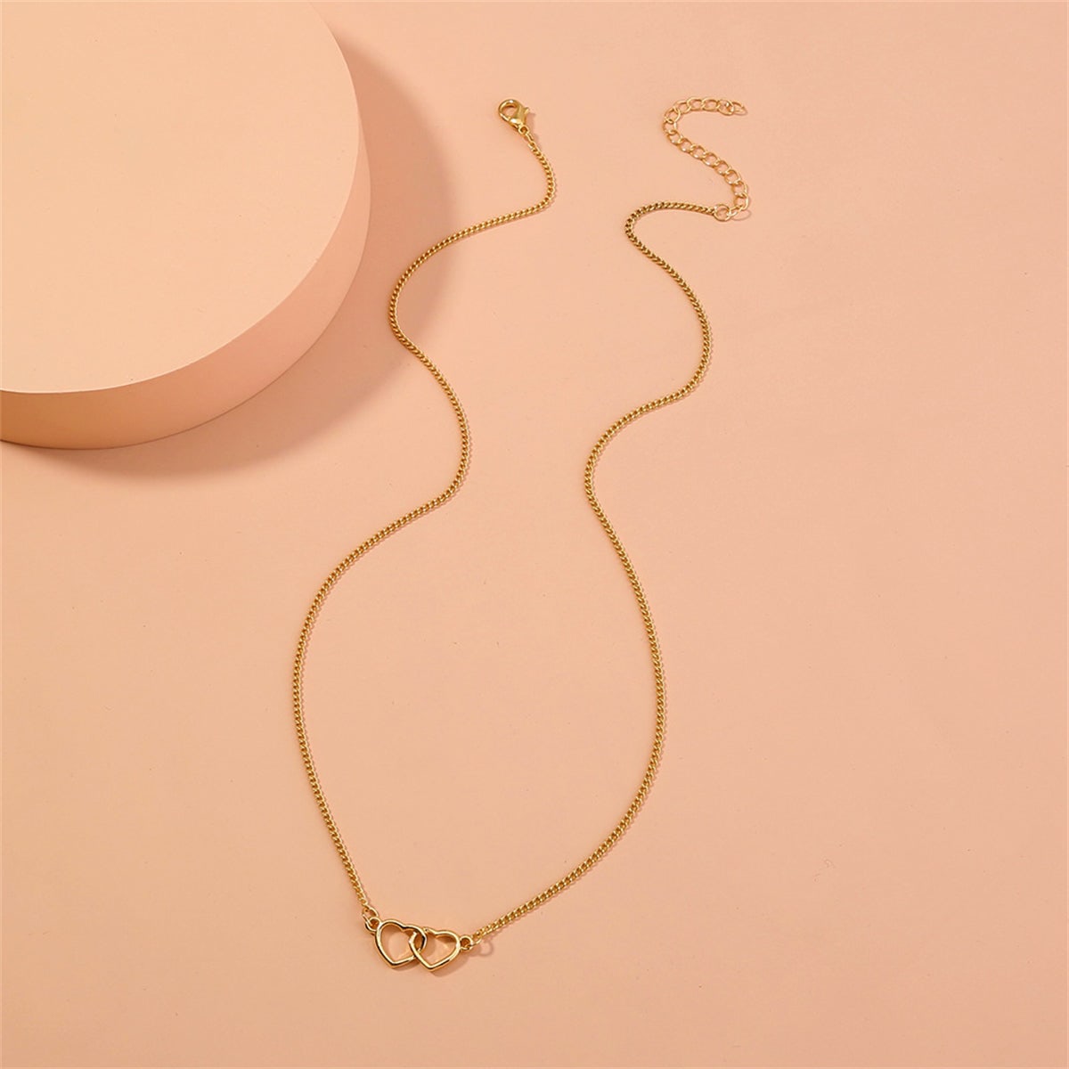 Goldtone Interlocked Heart Pendant Necklace