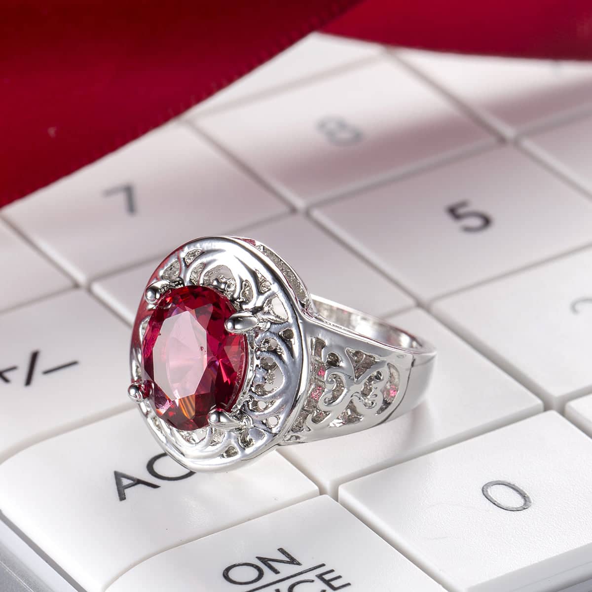 Red Crystal & Silvertone Openwork Oval Ring